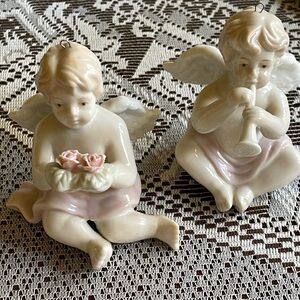 Antique Porcelain Bisque cherub set. Holding Trumpet and flowers. Detailed. EUC